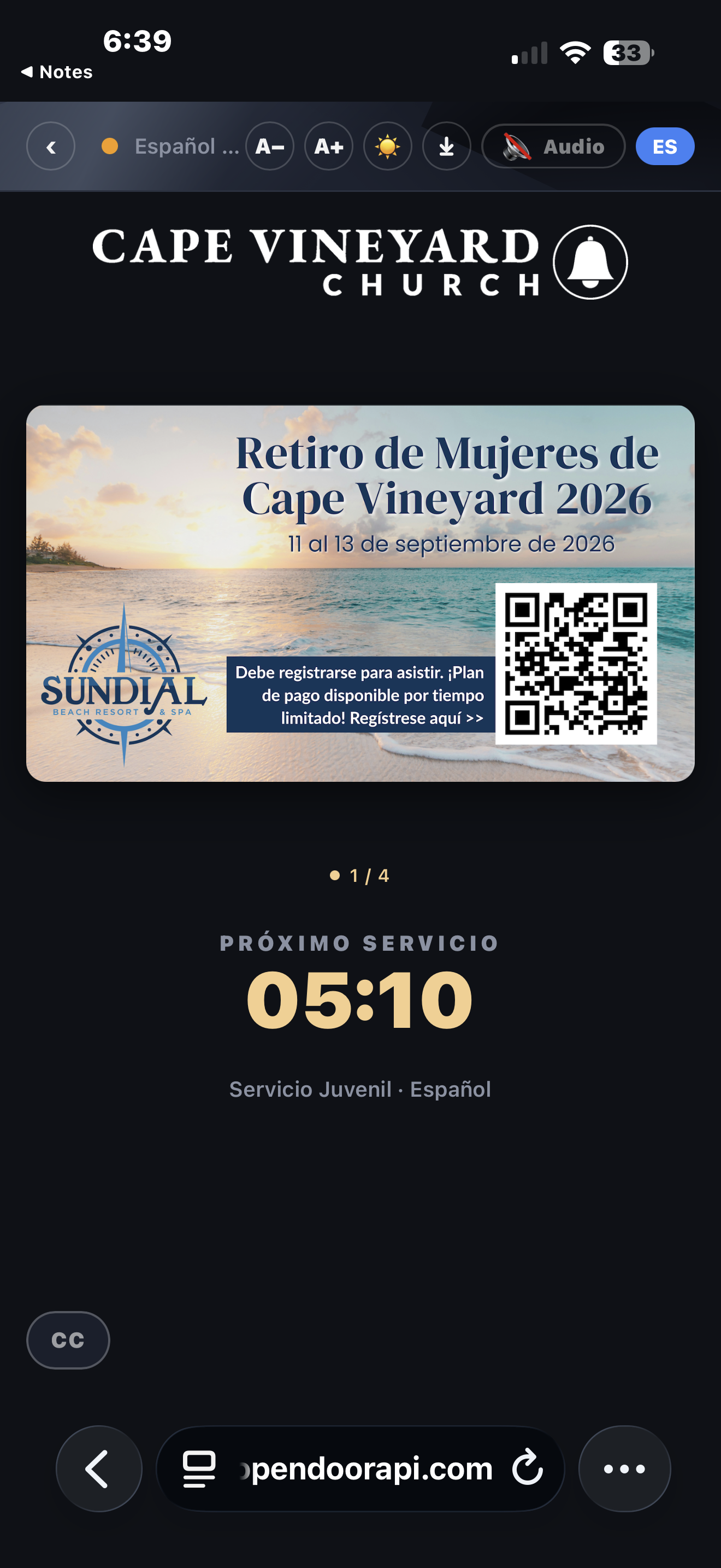 A listener phone showing a translated event announcement with a QR code and the next-service countdown