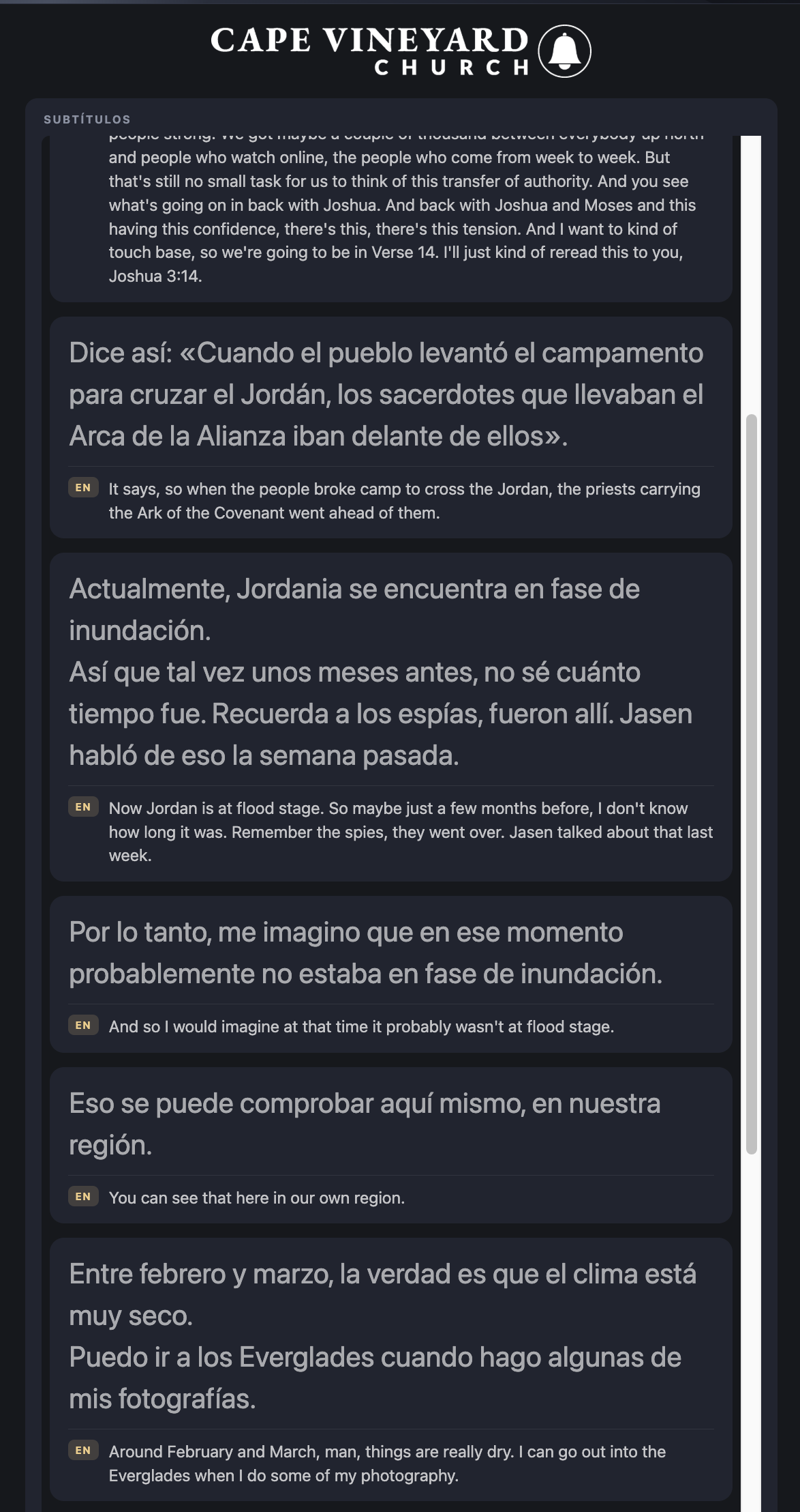 A real Cape Vineyard service on a guest's phone: consecutive Spanish caption blocks, each with the English source shown beneath it, under the church's own logo